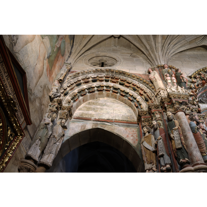 "monumental puerta del oeste (conocida como Pórtico del Paraíso) la más espectacular y llamativa de las entradas a la seo orensana, gracias a sus más que respetables dimensiones, a su enorme colección de estatuas pétreas y a los restos de policromía que conserva" [www.arteguias.com/catedral/orense.htm] [accessed 14 December 2019]