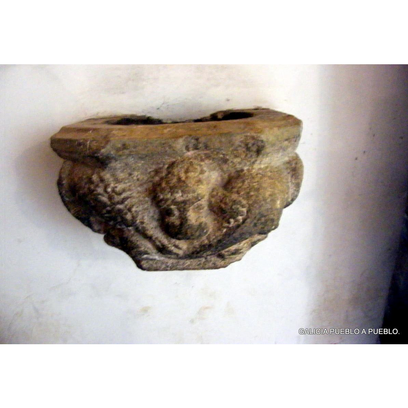 one of two wall-mounted by the exntranceway