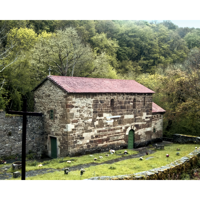 there are two possible fonts in view: one is visible here in the bottom left corner of the image, semi-hidden by the tall cross in the foregoroung; the other is visble at the opposite end of the image, towards the east end of the nave block and the south portal