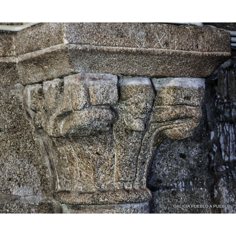 one of the capitals supporting the chancel arch