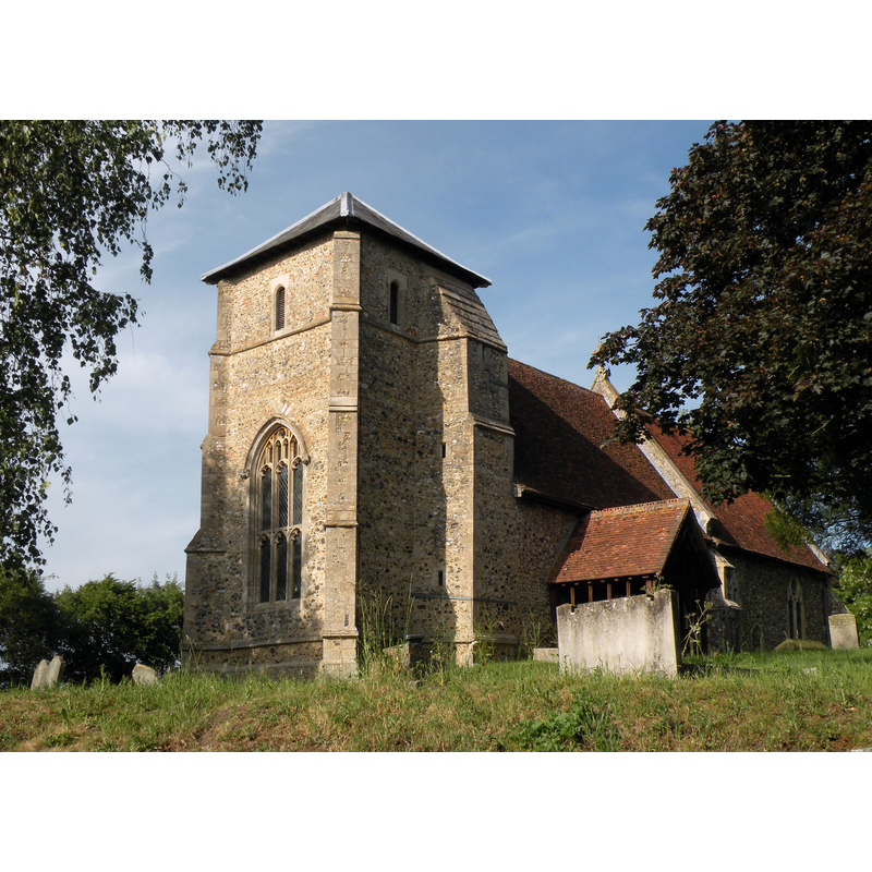 Source caption: "St. Nicholas: the parish church of Stanningfield. This church once had a much taller 14th century tower but the top was removed as it was classed as dangerous. Inside the church is an early 19th century photograph that shows the original tower."