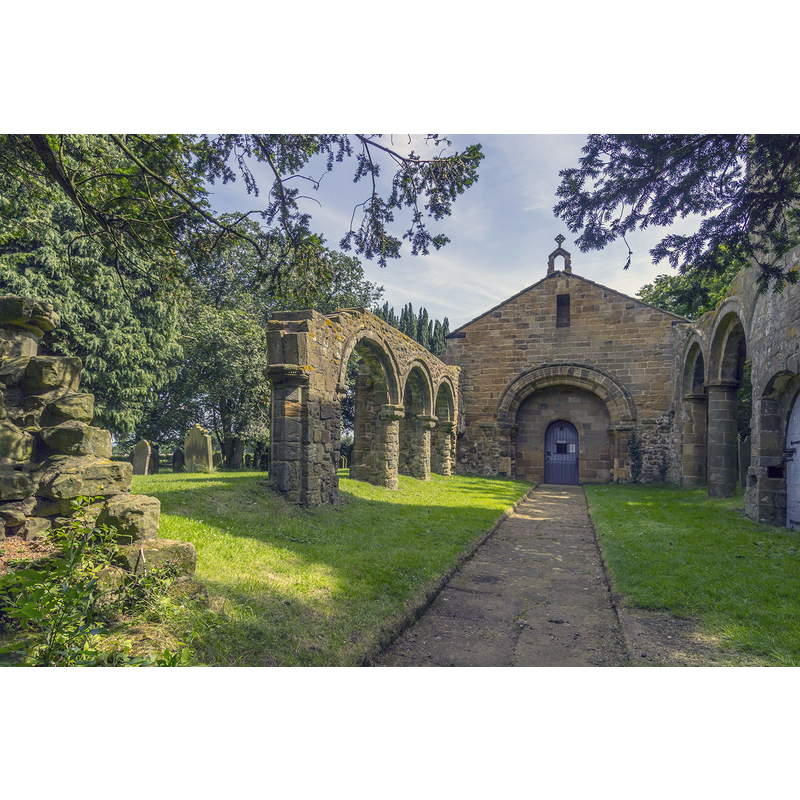 Source caption: "Inside the ruined nave of the church of the Holy Rood, Whorlton, North Yorkshire, looking east-northeast to the chancel"