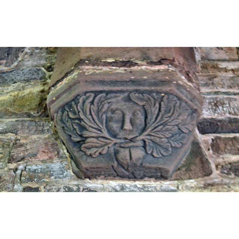 Source caption: "St Jerome, Llangwm Uchaf. The Green Man, a corbel in the chancel."