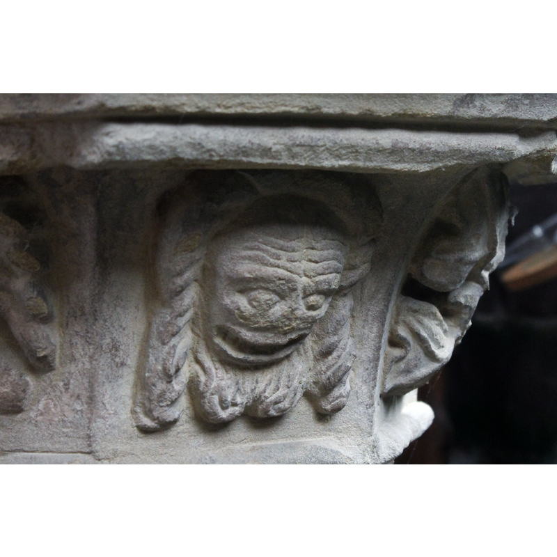 long braids and recessed hairline, looking almost grotesque or very distressed