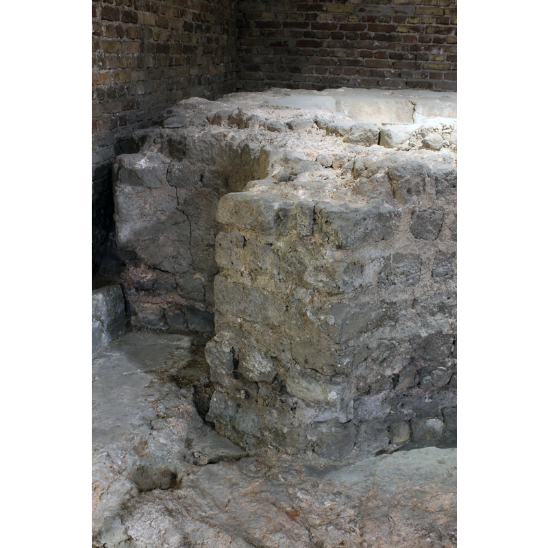 ruins of the baptismal font from a free-standing 7th-century baptistery existed in what is now the east end of the cathedral; the baptistery itself was demolished in the 9th century