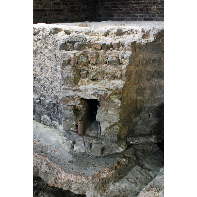 ruins of the baptismal font from a free-standing 7th-century baptistery existed in what is now the east end of the cathedral; the baptistery itself was demolished in the 9th century