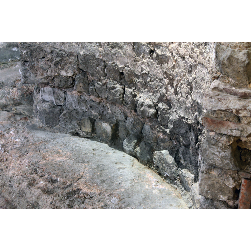 ruins of the baptismal font from a free-standing 7th-century baptistery existed in what is now the east end of the cathedral; the baptistery itself was demolished in the 9th century