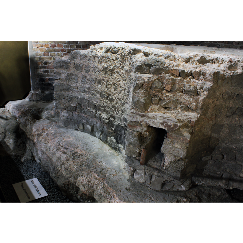 ruins of the baptismal font from a free-standing 7th-century baptistery existed in what is now the east end of the cathedral; the baptistery itself was demolished in the 9th century