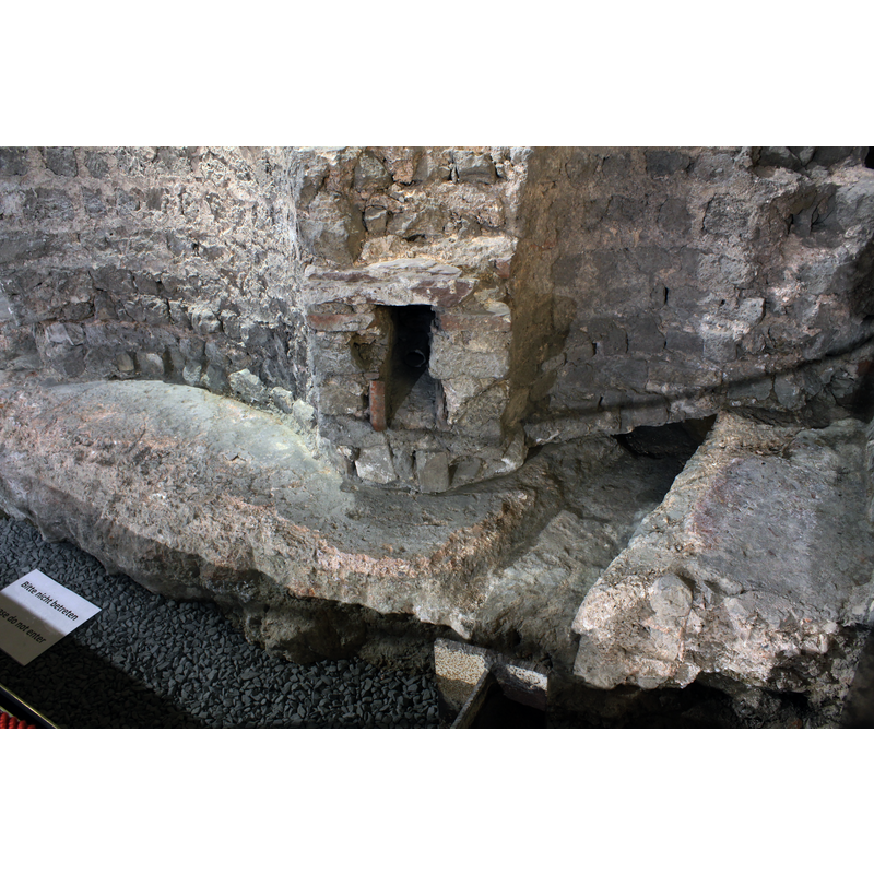 ruins of the baptismal font from a free-standing 7th-century baptistery existed in what is now the east end of the cathedral; the baptistery itself was demolished in the 9th century