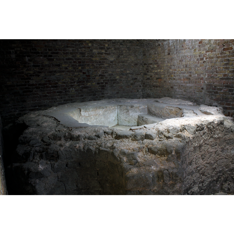 ruins of the baptismal font from a free-standing 7th-century baptistery existed in what is now the east end of the cathedral; the baptistery itself was demolished in the 9th century