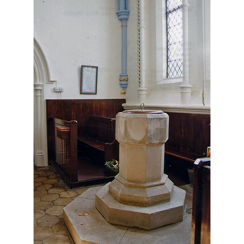 the new Holy Spirit church was built on the ruined site of the medieval chapel -- the font is also modern