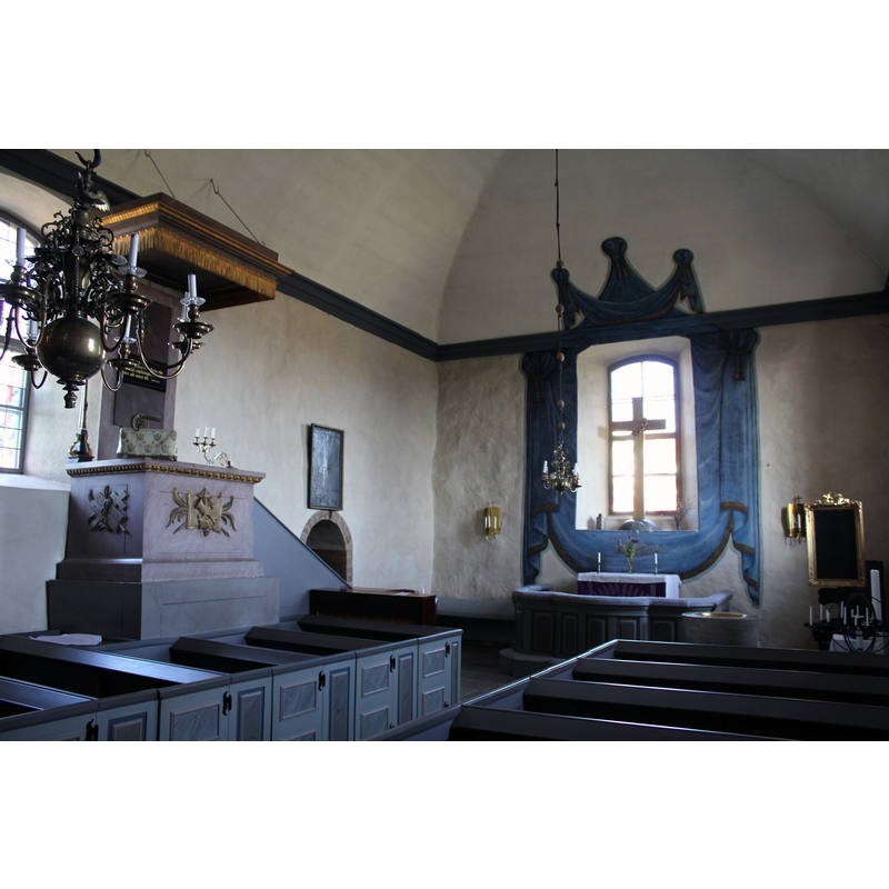 the top of the font is visible at the east end of the nave, south side