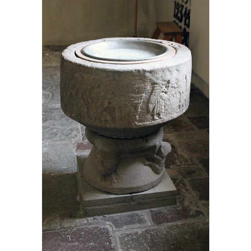 the basin programme is very worn and its details very hard to discern -- both arches visible here contain human figures