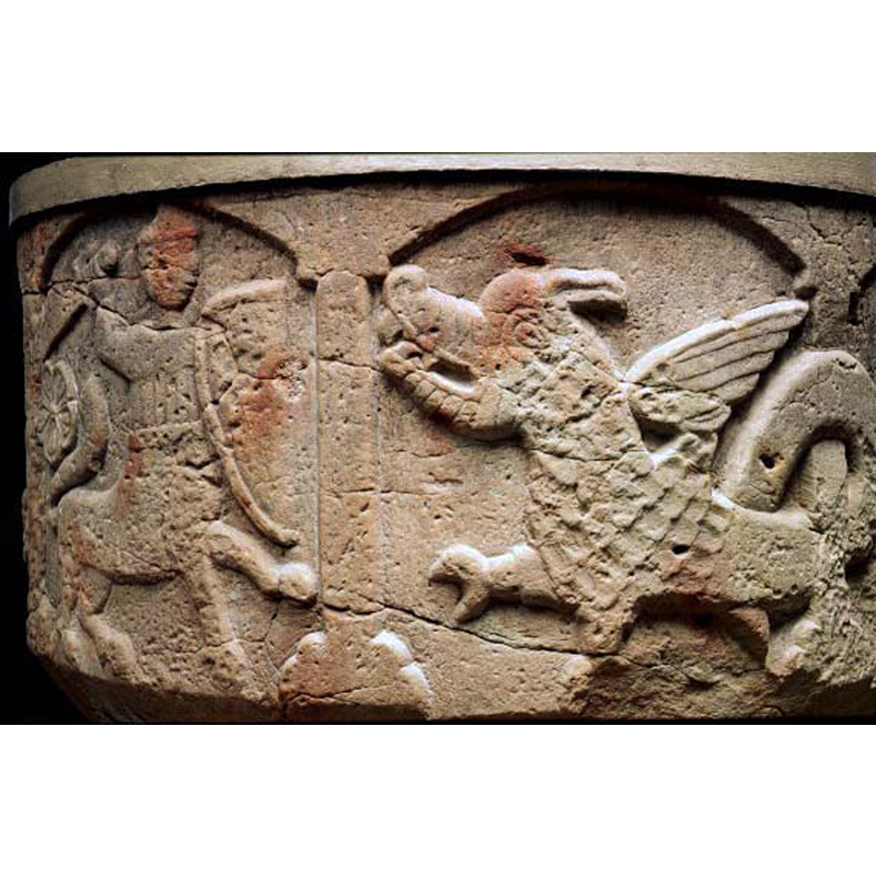 notice the dragon's tail coiled around one of the supporting columns, and the large floral motif behind the centaur
