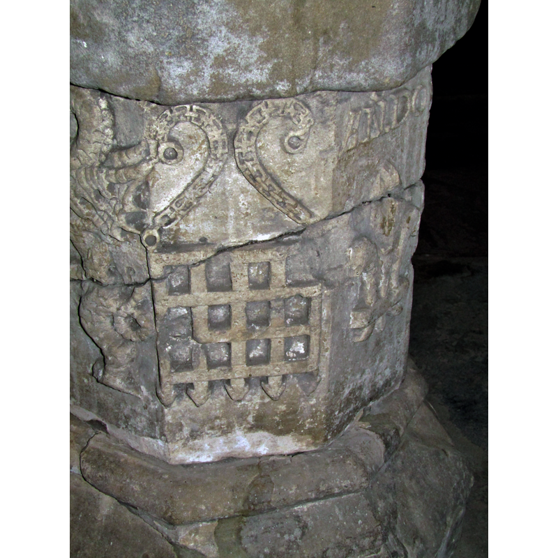one of two such on this font -- originally a badge of the House of Beaufort, adopted later by Henry VII (1457-1509); this version without a crown on it