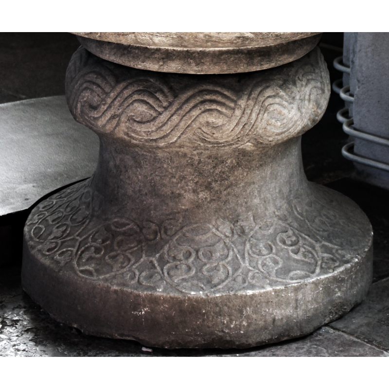 a plain one at the bottom of the underbowl, above the broad centre ring of the base