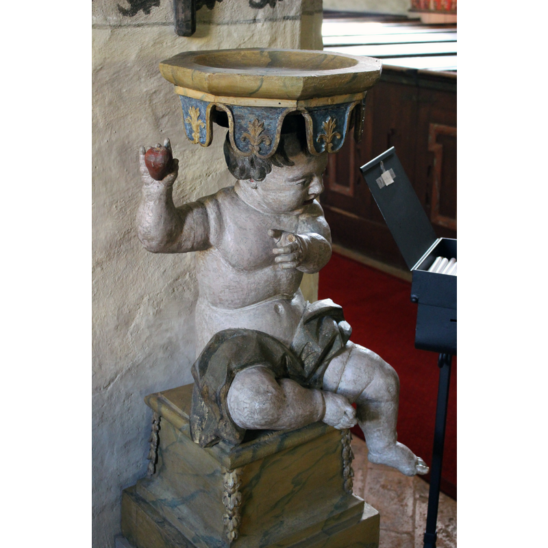 located at the west end of the nave