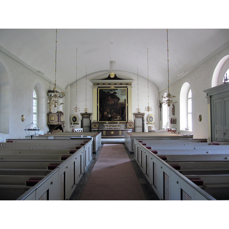 the interior of the 19thC church; the top of the medieval font is discernible at the far [east] end, right [south] side
