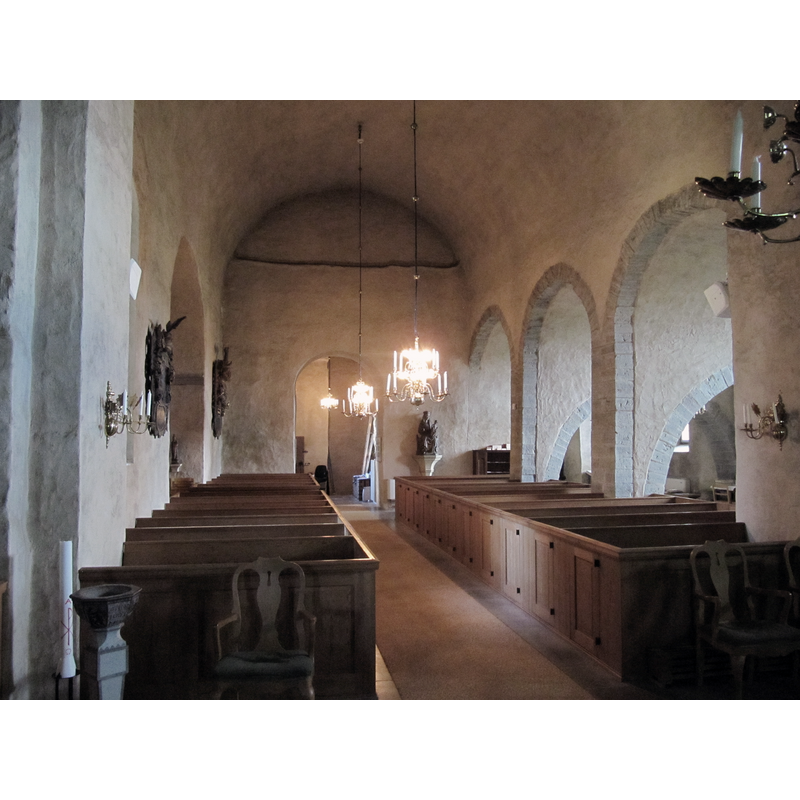 notice the 17thC baptismal font partially visible in the foreground, bottom left corner
