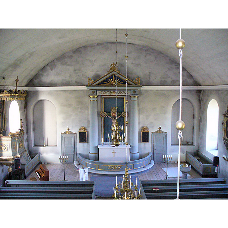 the medieval font is visible in the southeast corner of the modern church