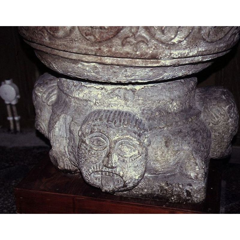 the font displayed inside the church after its return from the SHM