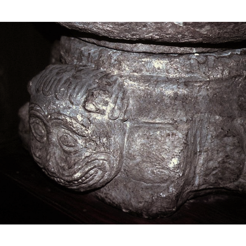 the font displayed inside the church after its return from the SHM