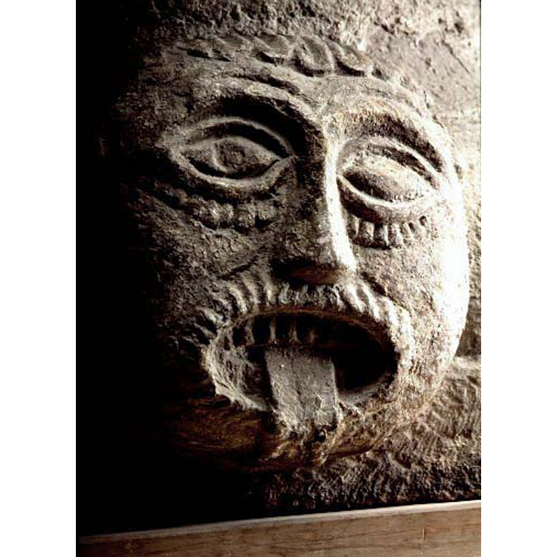 the caption for all four heads in Medeltidens bildvärld reads simply "manshuvud", but Erk Lundberg describes this one quite appropriately as "Trollhuvud"