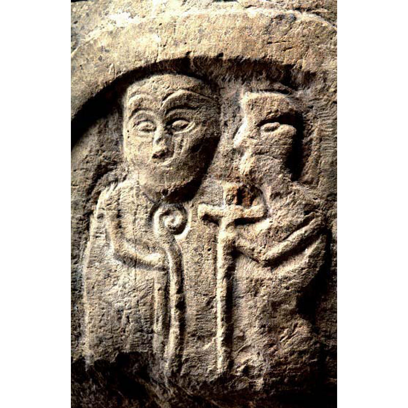 the figure on the left faces the viewer; the figure on the righ in profile