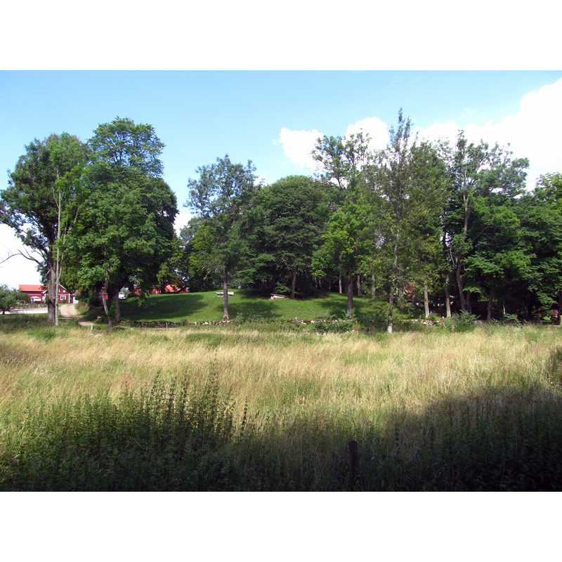 Source caption: "The small hill where the old church of Broddetorp once stood."
