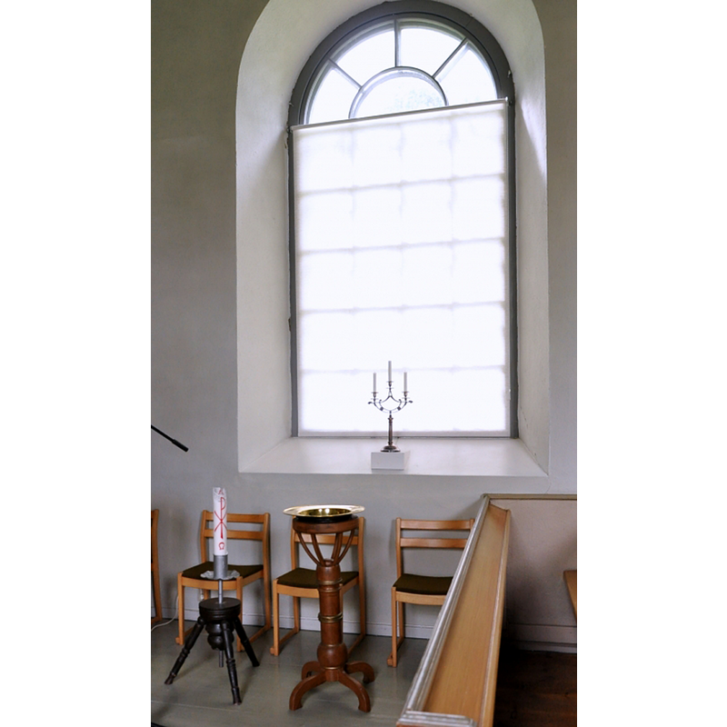 the modern wooden font in the context of the interior of the 1883 church