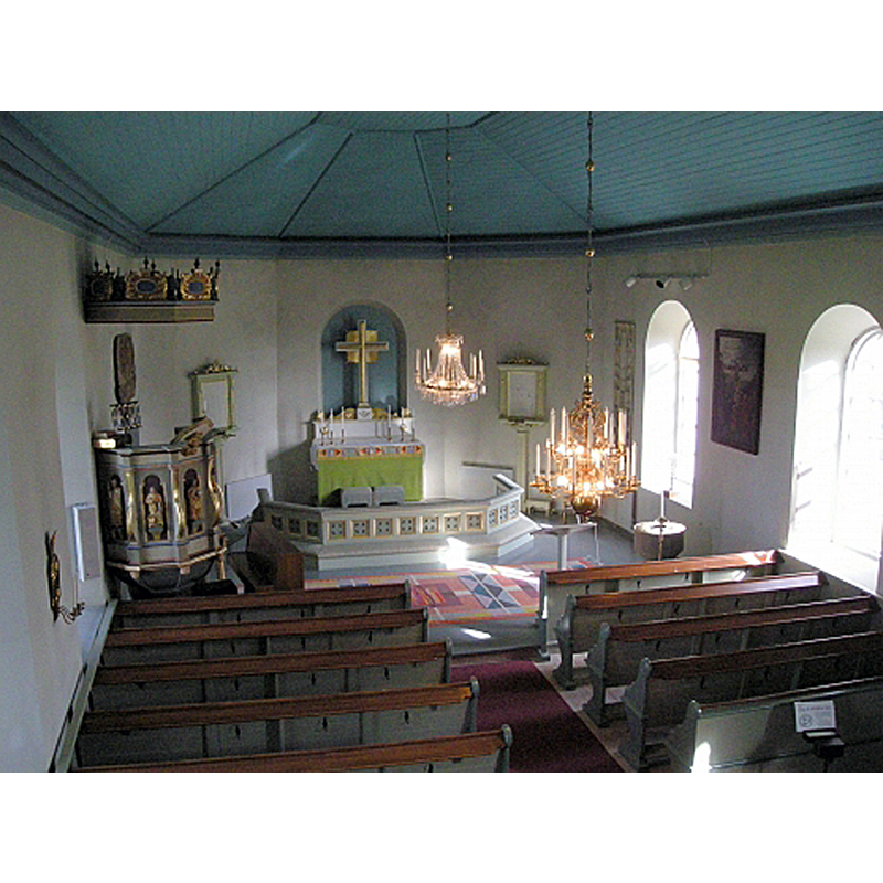 notice the old font at the east end of the nave, south side