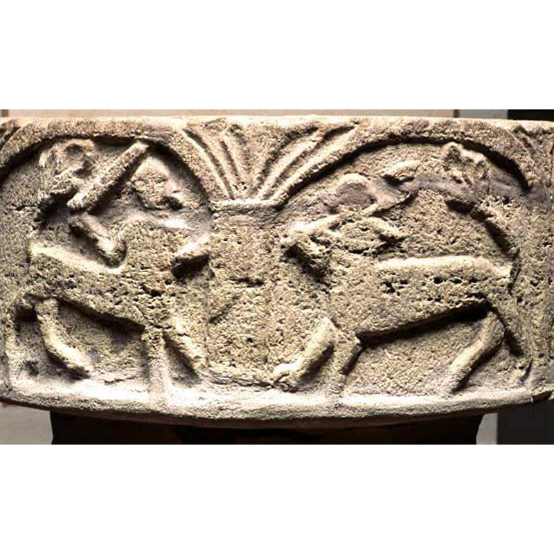 the caption for this image in the SNM database reads: "motställda, stridande kentaurer", but the fidure on the right is probably a lion rather than a second centaur; the area of the head or upper body is damaged, making the identification difficult -- both beasts have foliated tails; the beast on the right may have been in a passant-regardant pose, with a foliated tongue facing the right
