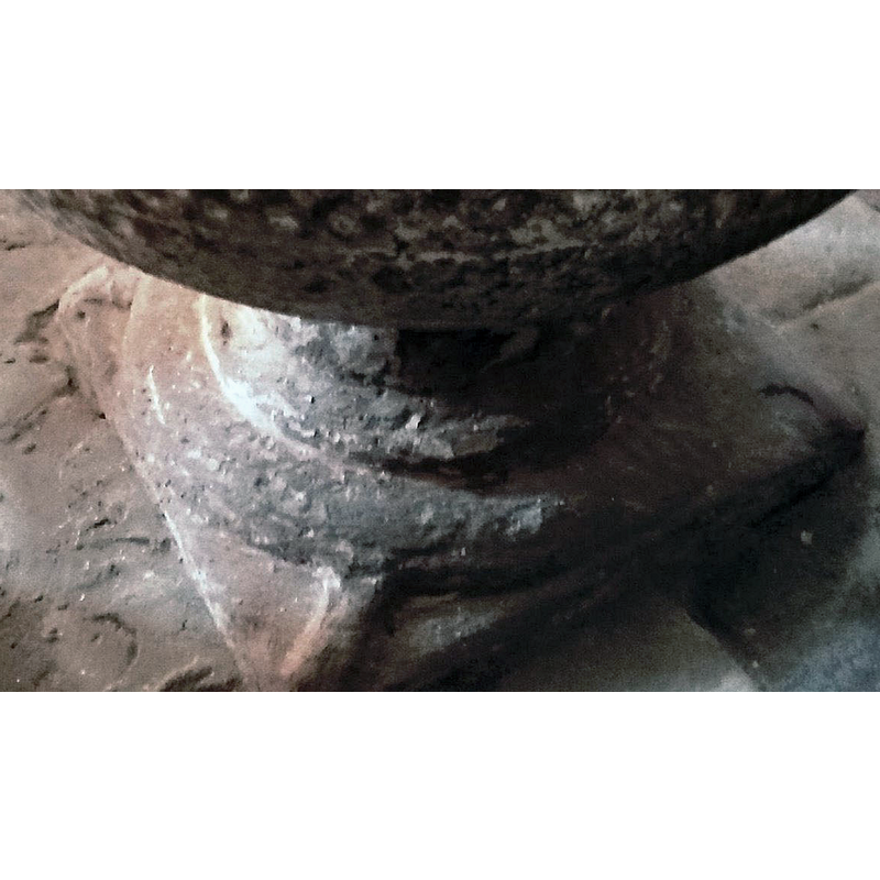 at the four angles of the lower base