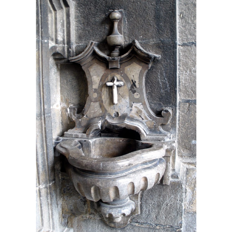one of two wall-mounted at the sides of the west portal