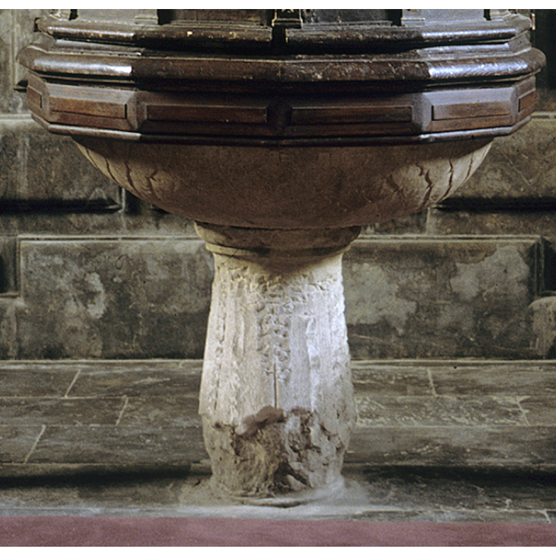 the upper part of the basin is hidden under the lower end of the canopy of the wooden cover