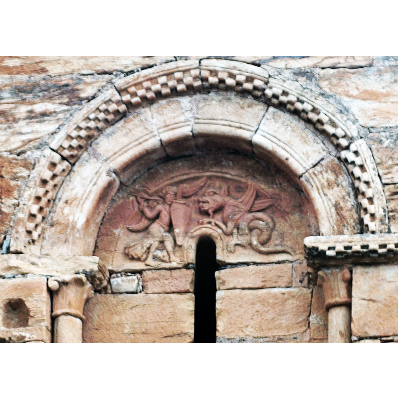 scene of Stt Michael and the dragon in the tympanum of the left [west] window