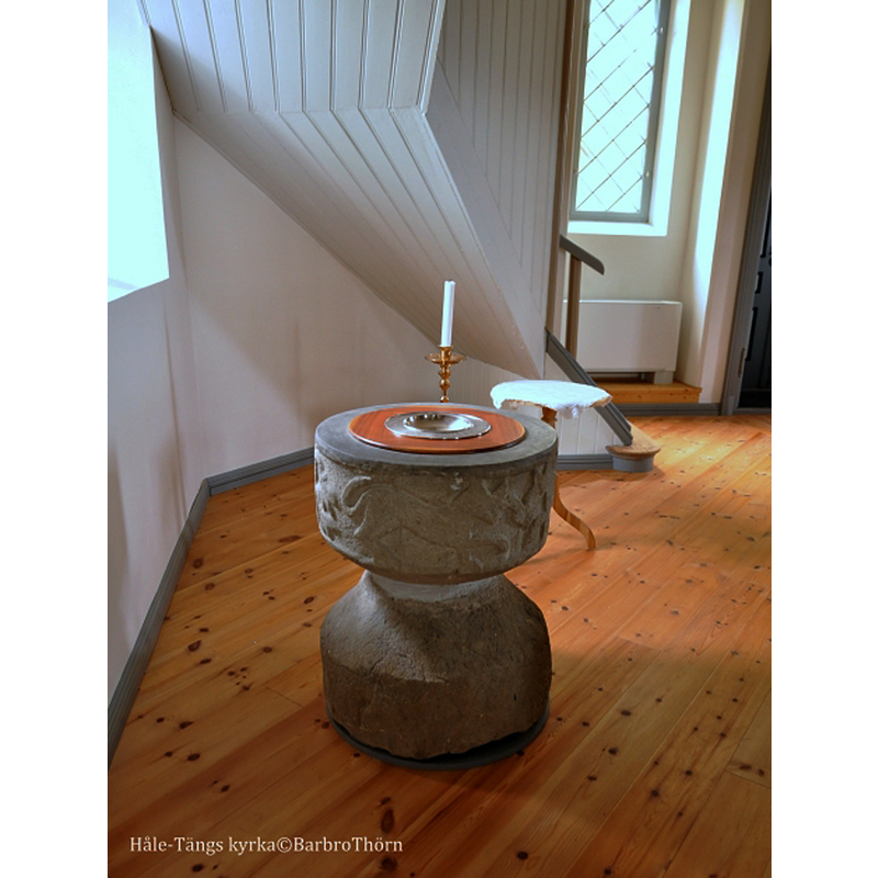 medieval baptismal font in the new parish church of Håle-Täng, said to be originally from the demolished medieval church at Täng