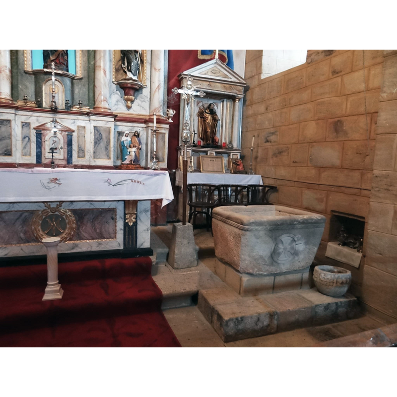 the font at the southeast corner of the nave, right [south] of the altar