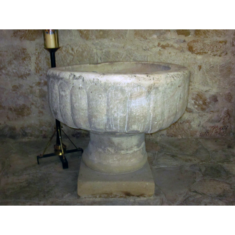 the square plinth appears modern