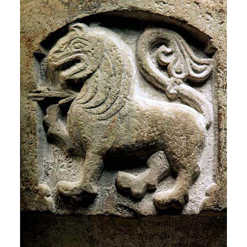 the lion raises its front right paw as if to catch the arrow aimed at its chest/neck -- notice the acanthus-like tail