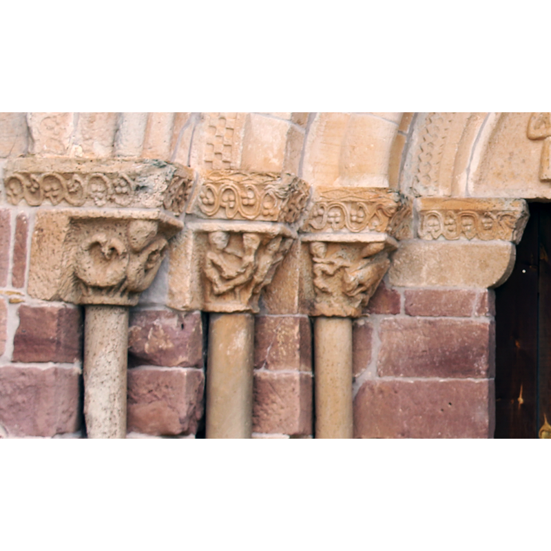 historiated capitals: birds, wrestling or dancing, wild-boar hunt?