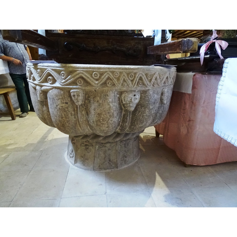 not easily discernible in the centre panel of the lower base; (the arms of the cross may be floriated)
