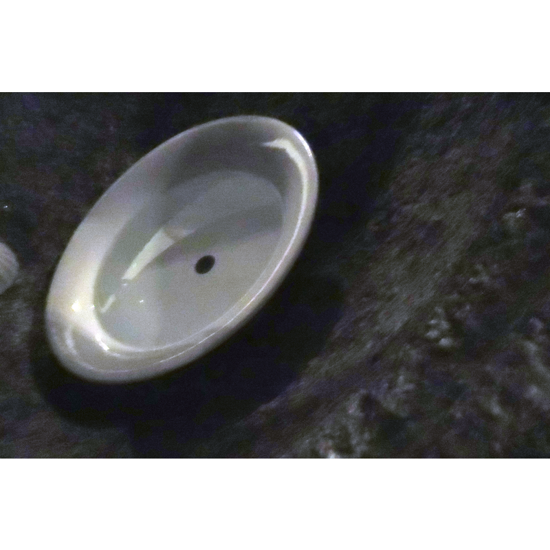 [NB: unfortunately the source did not record whether there is a drain hole under the modern dish]
