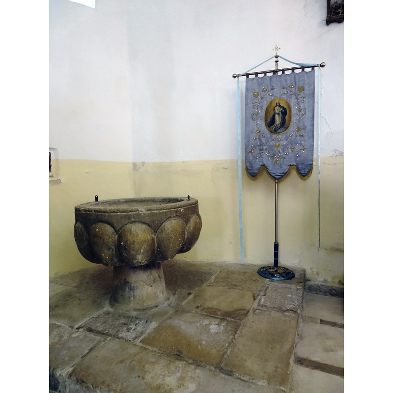 at the northwest corner of the nave