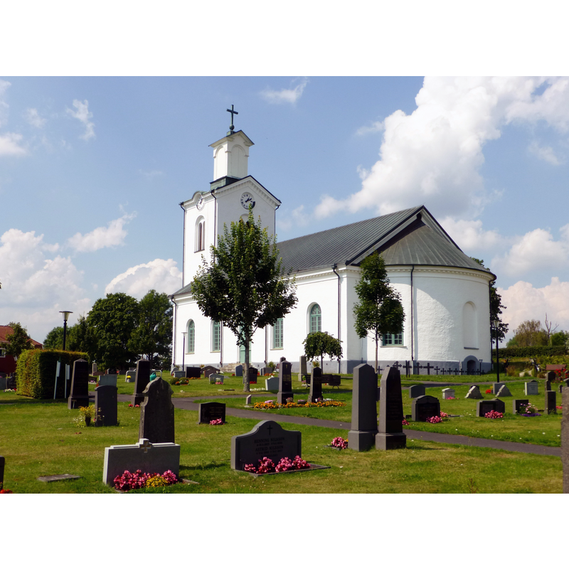 Source caption: "Kalvsviks kyrka. Kyrkan uppfördes i nyklassicistisk stil efter ritningar av Fredrik Wilhelm Scholander. Kyrkan togs i bruk redan 1852 men invigdes inte förrän 1861 av biskop Henrik Gustaf Hultman"