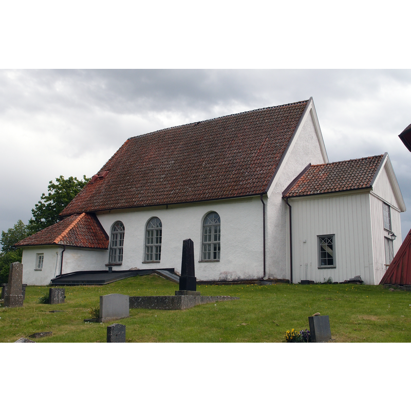with a partial view on the right of the detached belfry built in 1737
