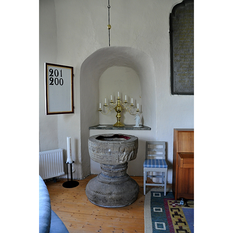 the medieval baptismal font seen here in the southeast corner of the nave; the communion railing in blue in the bottom-left corner of the image [cf. FontNotes]