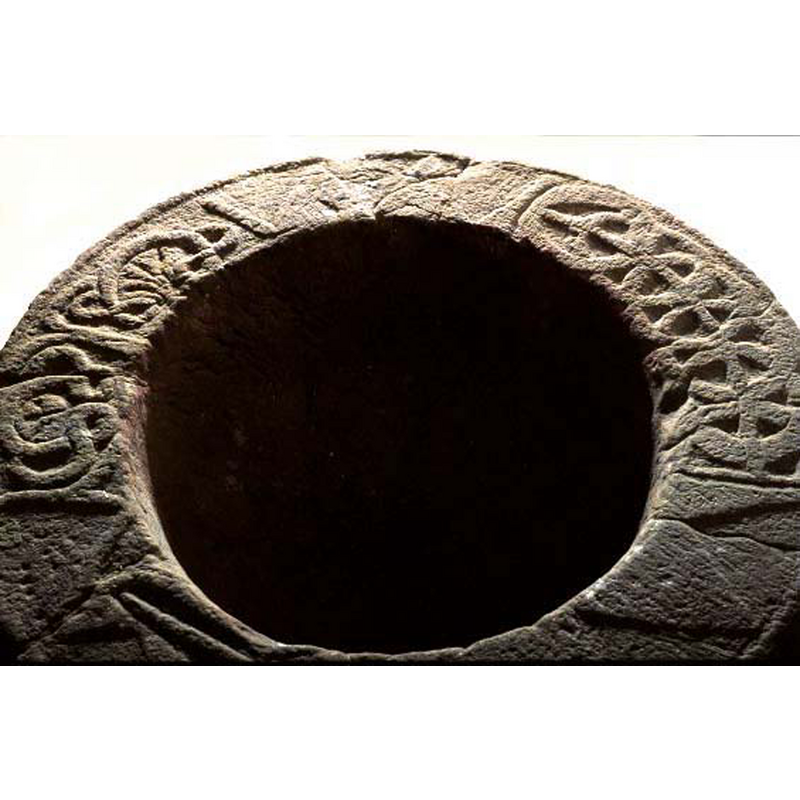One of the few medieval Swedish fonts with such an ornate upper rim