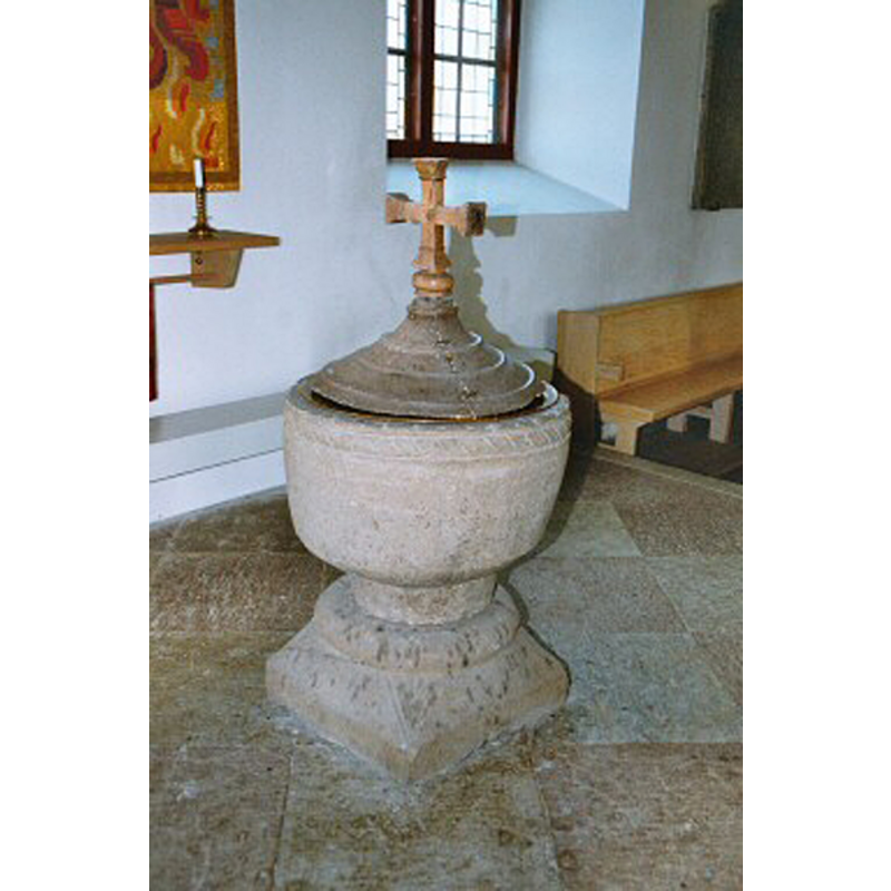 the old font and cover in the new church, southeast corner of the nave