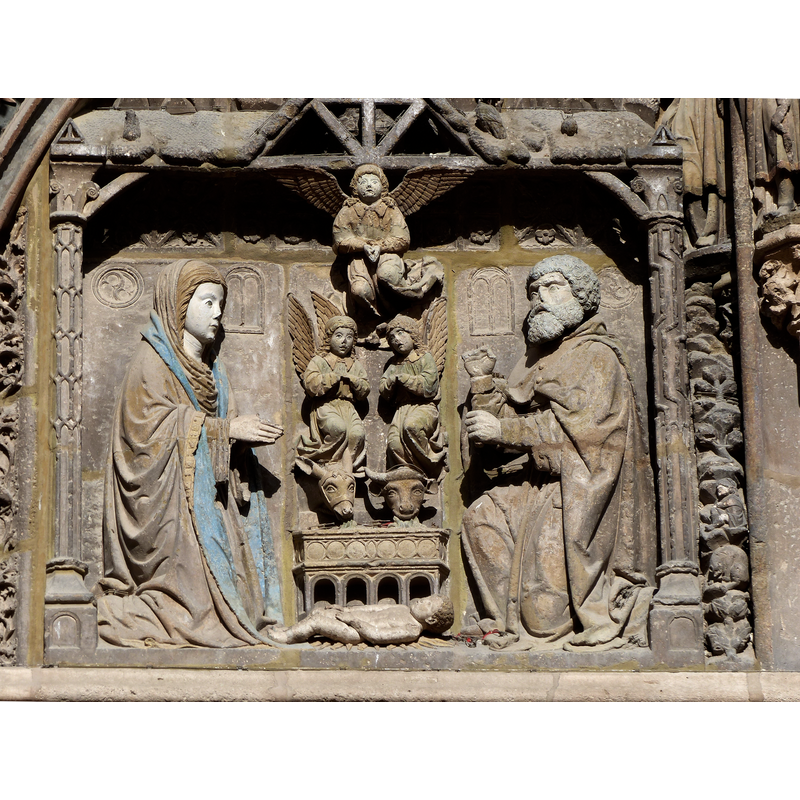 Source caption: "Portada sur de la iglesia Santa María la Real, Aranda de Duero, Burgos"  [NB: the fancy manger is for the beasts' fodder while the Child gets the ground!]